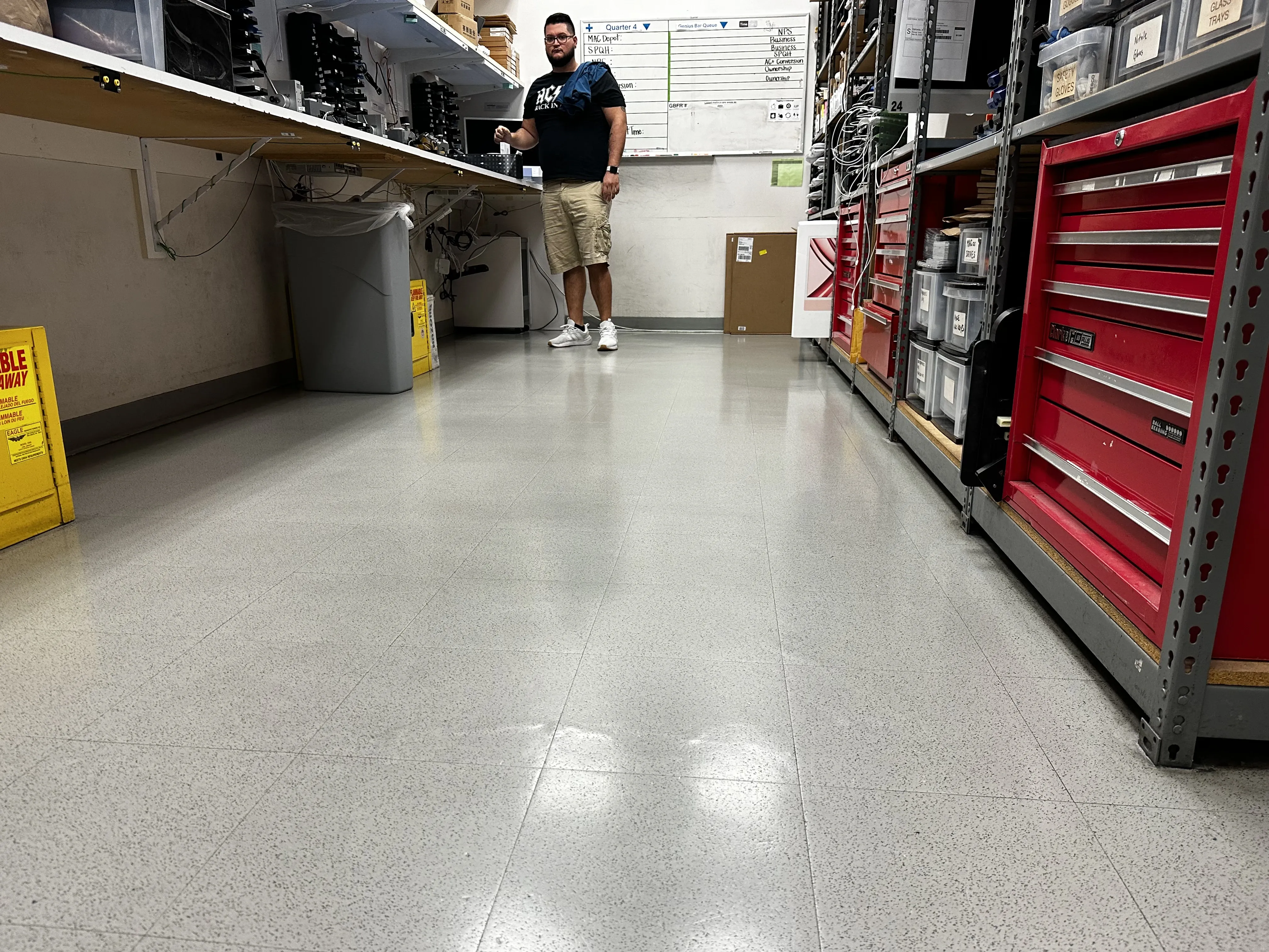 Apple store sales floor showing a precisely waxed VCT surface