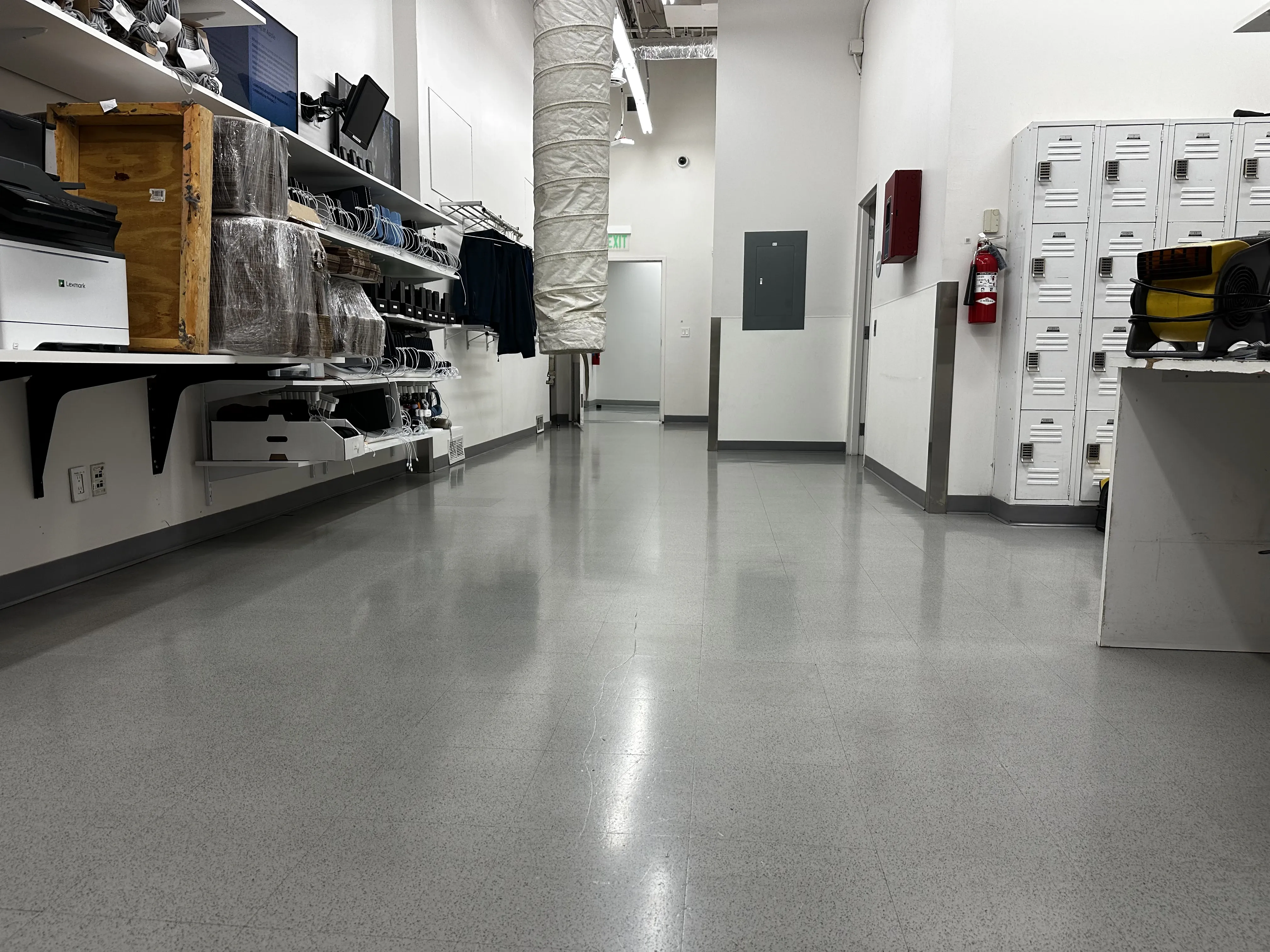 Apple store VCT backroom flooring after a top-coat refresh