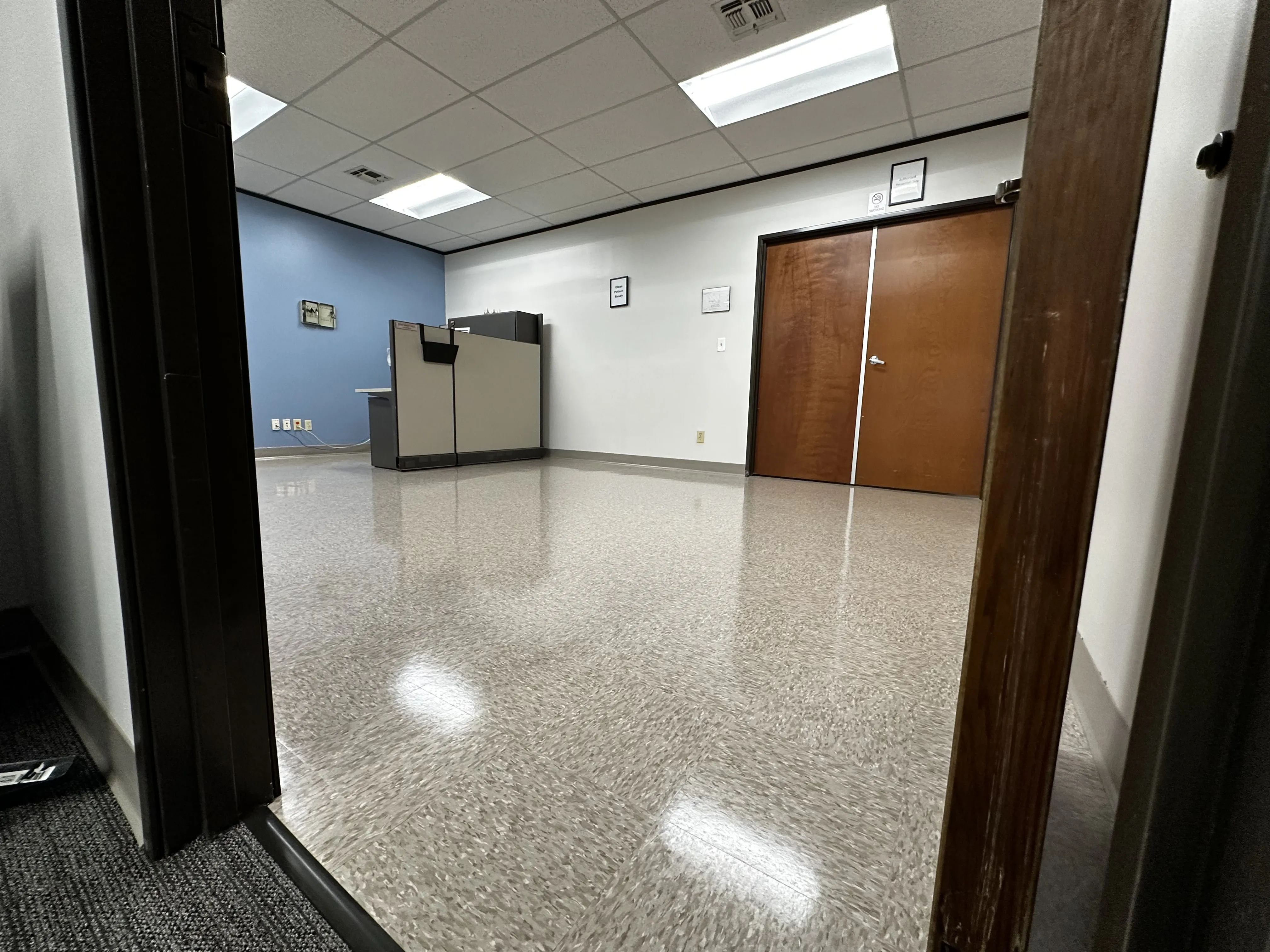 Commercial office VCT floor with a high-shine wet-look wax finish