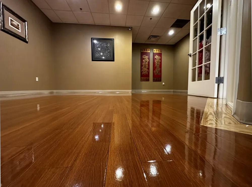 Refinished hardwood grain showing the protective wax finish The Floor Doctor applies